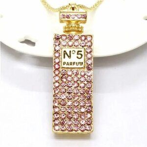 NWT. Betsey Johnson. Gold/ Pink Crystals CHANEL 5 Perfume Bottle Necklace.